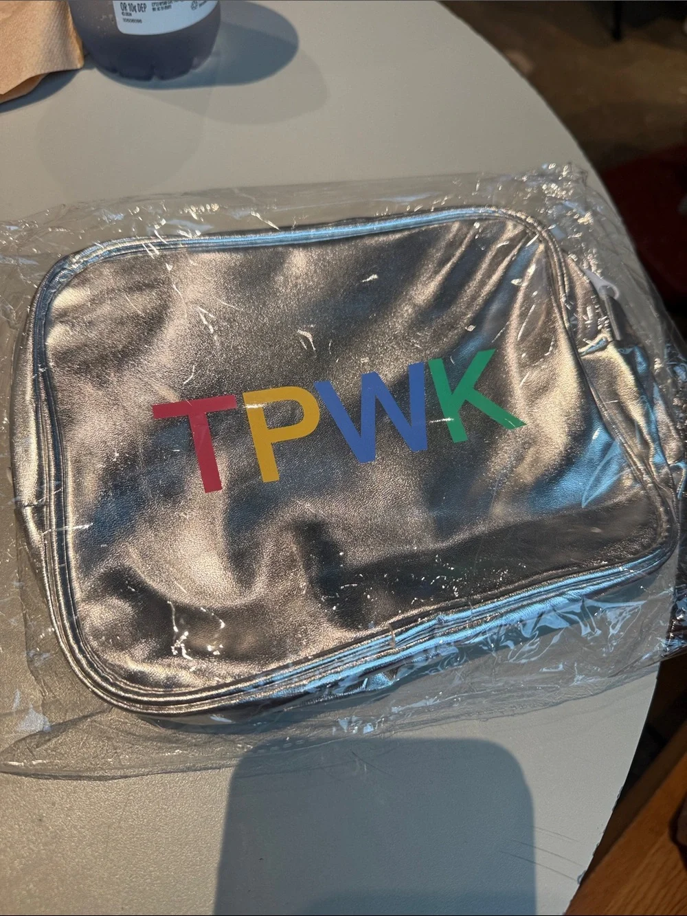 Harry Styles Merch TPWK Silver Makeup Bag Treat People With Kindness Case